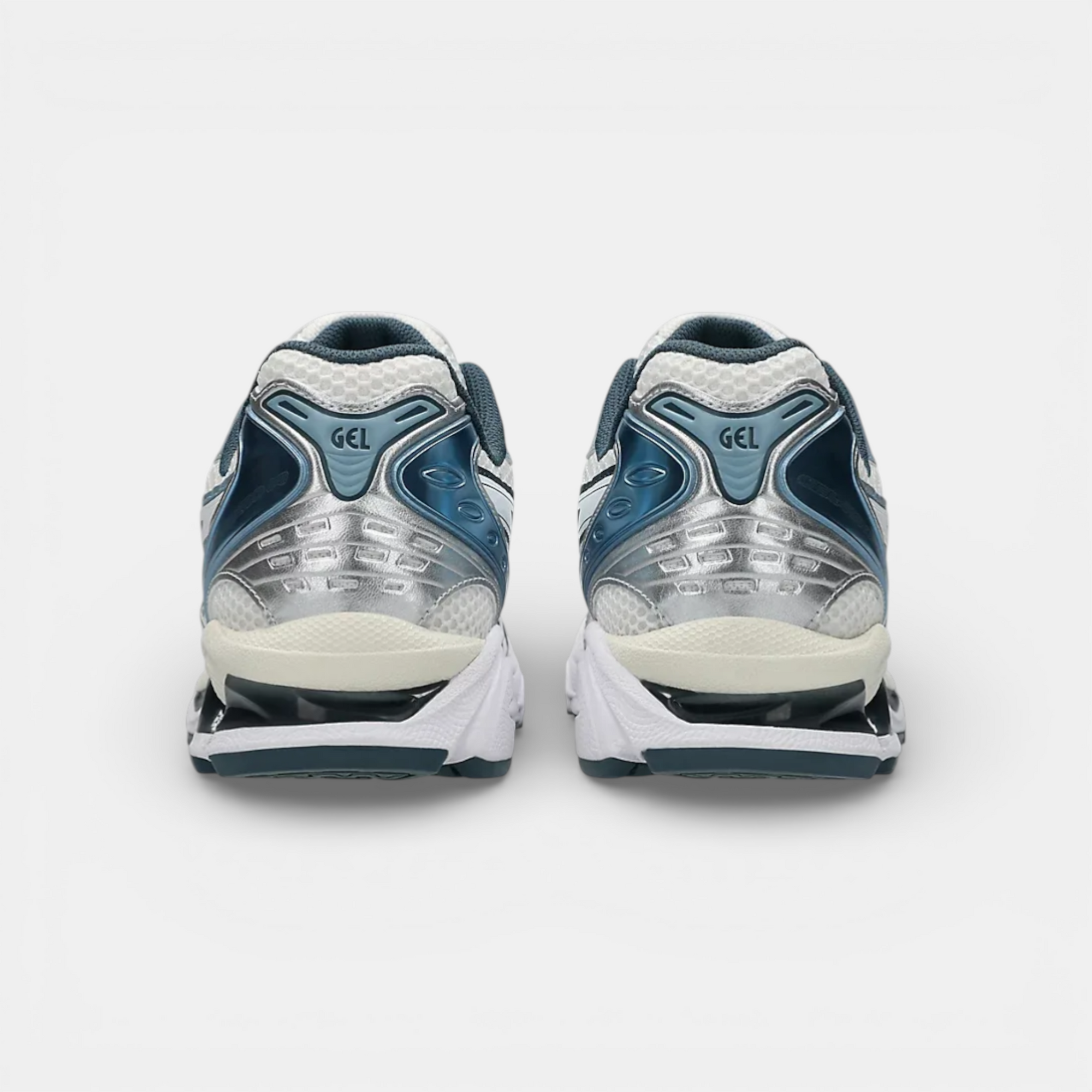 ASICS Gel-Kayano 14 running shoes in cream, raw indigo, and silver. Features GEL cushioning and TRUSSTIC SYSTEM.